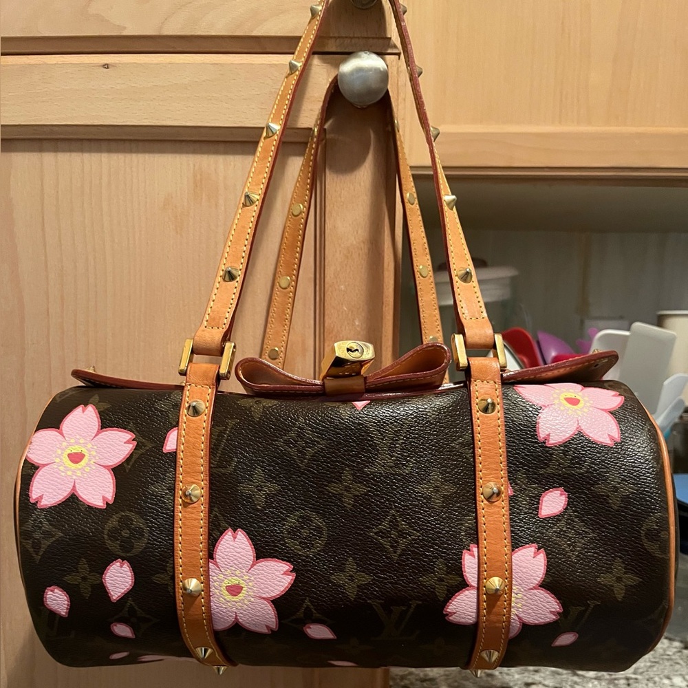 Pretty Inspired iconic logo bag. Used and in good condition. See pictures